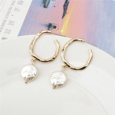 ​Κομψά σκουλαρίκια