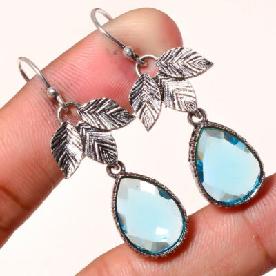 Σκουλαρίκια, κατασκευασμένα από ασήμι 925. Διακοσμημένα με Swiss Blue Topaz