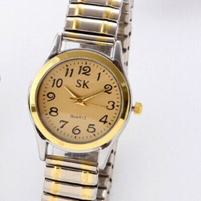 Γυναικείο ρολόι με ελαστικό δίχρωμο μπρασελέ.