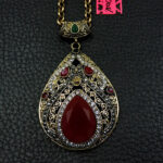 Χειροποίητο μενταγιόν από χαλκό και ασήμι