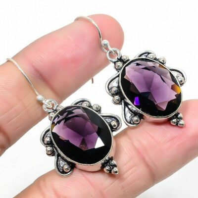 Σκουλαρίκια κατασκευασμένα από ασήμι 925 και διακοσμημένα με αφρικανικό αμέθυστο