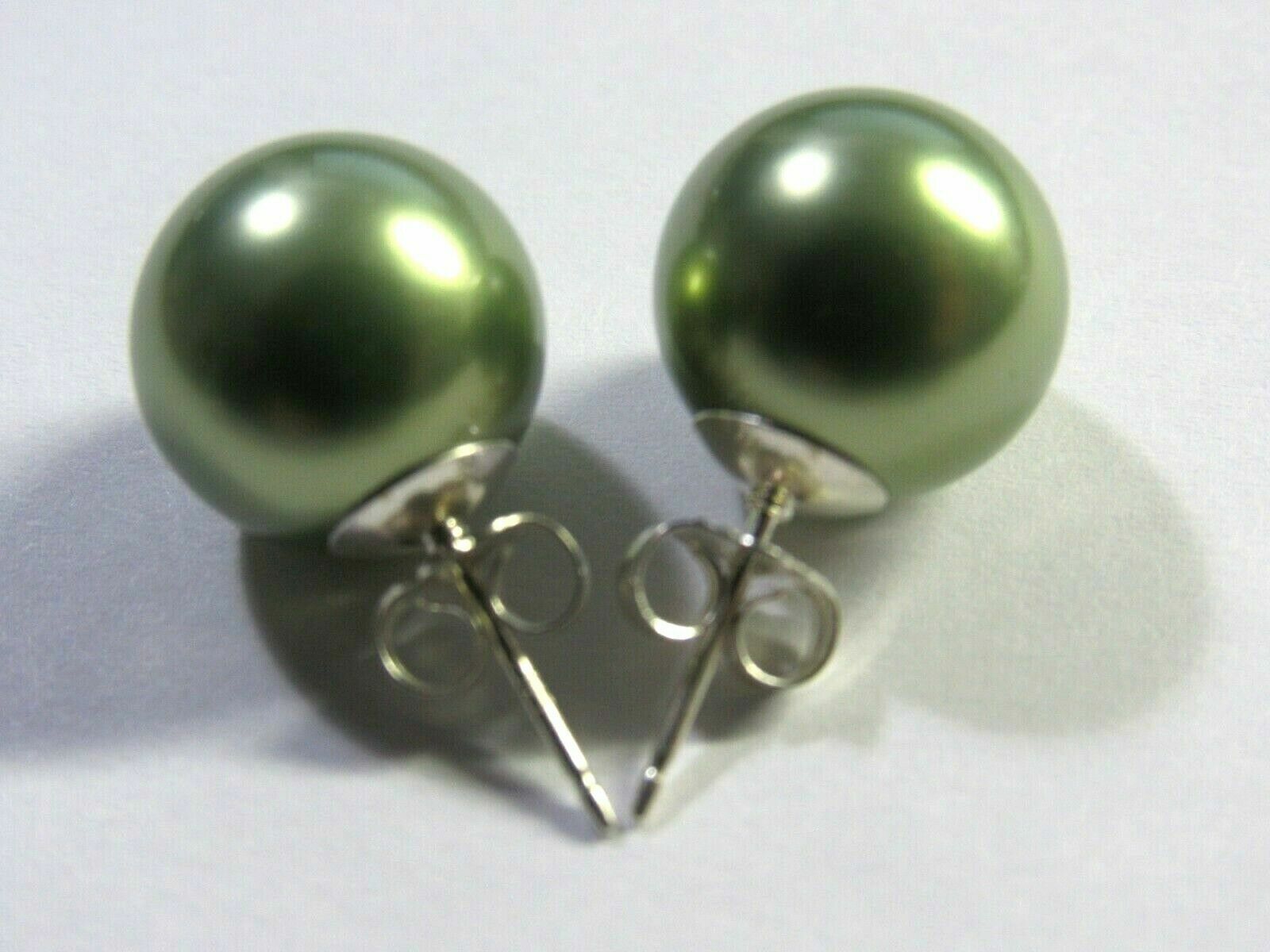 Ασημένια σκουλαρίκια κατασκευασμένα από ασήμι 925 διακοσμημένα με πράσινη round south sea shell 10mm. Ασημένια σκουλαρίκια κατασκευασμένα από ασήμι 925 διακοσμημένα με πράσινη round south sea shell 10mm.