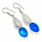 Aσήμι 925 και διακοσμημένα με λαμπερά μπλε τοπάζ